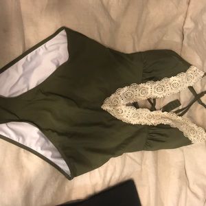 Green one piece swimsuit w/ deep front plunge
